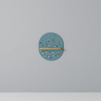 COLLECTIVE STREAM Oval Art Shelf In Oak Effect