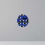 GEOMETRIC EYES Ovales Kunstregal in Schwarz