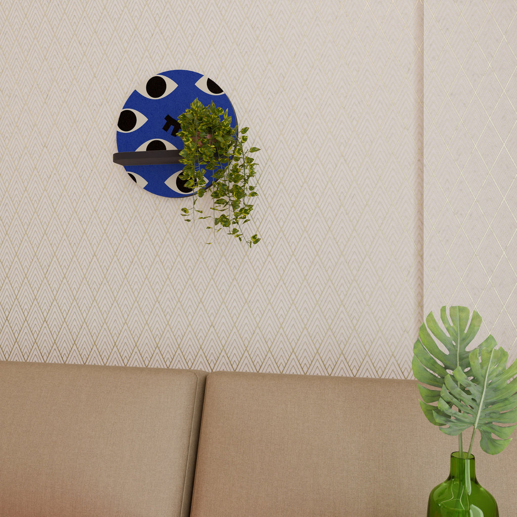 GEOMETRIC EYES Rundes Kunstregal in Schwarz