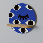 GEOMETRIC EYES Rundes Kunstregal in Eiche-Optik