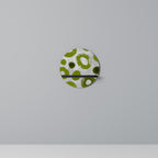 GREEN RHAPSODY Rundes Kunstregal in Schwarz