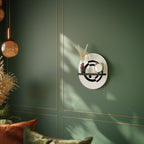 ORBITAL FLOW Ovales Kunstregal in Schwarz