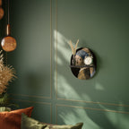 STRUCTURAL MASTERPIECE Ovales Kunstregal in Schwarz