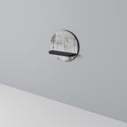 FADE IN THE TREES Rundes Kunstregal in Schwarz