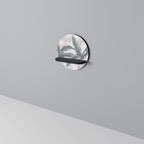 DELICATE BLISS Rundes Kunstregal in Schwarz