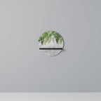 URBAN TROPICS Rundes Kunstregal in Schwarz