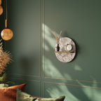 WILD TENDERNESS Ovales Kunstregal in Eiche-Optik