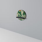 VERDANT PLEASURES Rundes Kunstregal in Schwarz