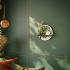 WILDERNESS DASH Rundes Kunstregal in Schwarz