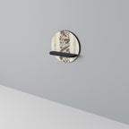 FOLIAGE TALES Rundes Kunstregal in Schwarz