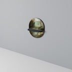 SUNLIT STILLNESS Ovales Kunstregal in Schwarz