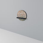 BUILDING THE FUTURE Rundes Kunstregal in Schwarz