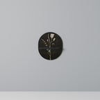 MEADOW ART. Ovales Kunstregal in Schwarz