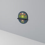 MEADOW IDYLL Ovales Kunstregal in Schwarz